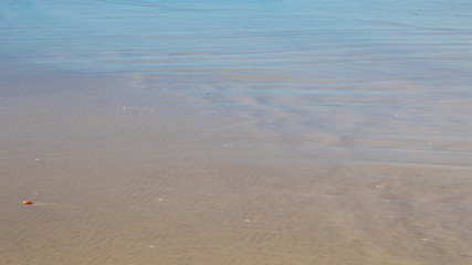 Fototapeta na wymiar light in the Sea sand