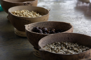 Grano de café en fondo rustico