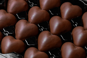 Heart shaped chocolates. Valentine day concept.