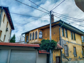 Old looking house with traditional and oriental design style in the neighborhood with historical look of the exterior