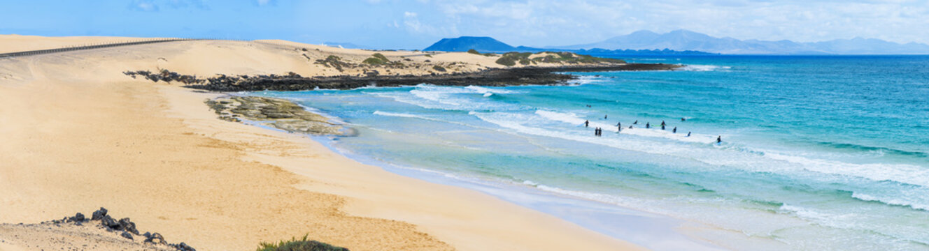Waves on the beach and serfer as a background
