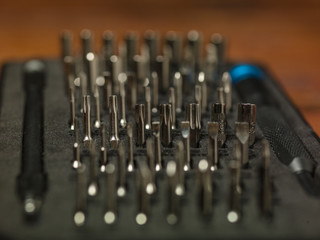 Close-up on bits, metal tips for various screws