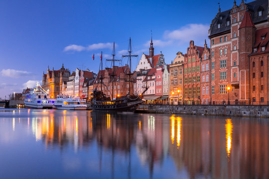 Beautiful scenery of the old town in Gdansk over Motlawa river at dawn, Poland.