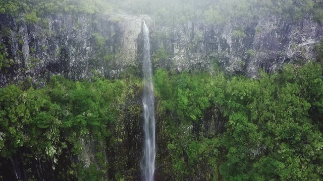 Aerial drone view of "Lagoa do Vento" waterfall in "Paul da Serra", Madeira island, Portugal
