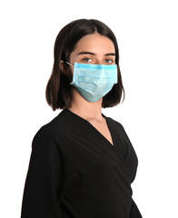 Woman with disposable mask on face against white background