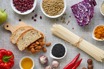 Various vegetarian products on a gray background