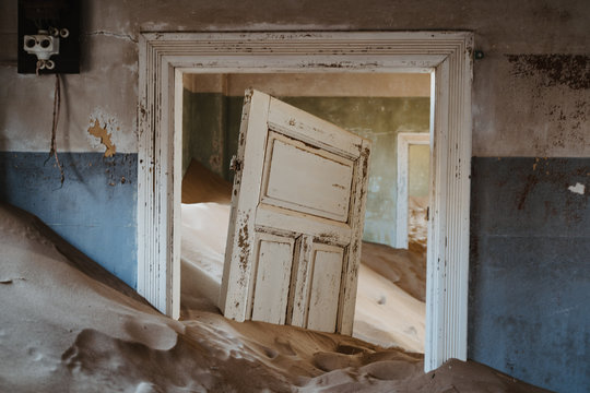 Door Left Stuck In Desert Sand Inside Old House