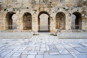 Odeon of Herodes Atticus facade entrance  in Athens, Greece. Also known as Herodeion is a stone Roman theater located on Acropolis hill slope.