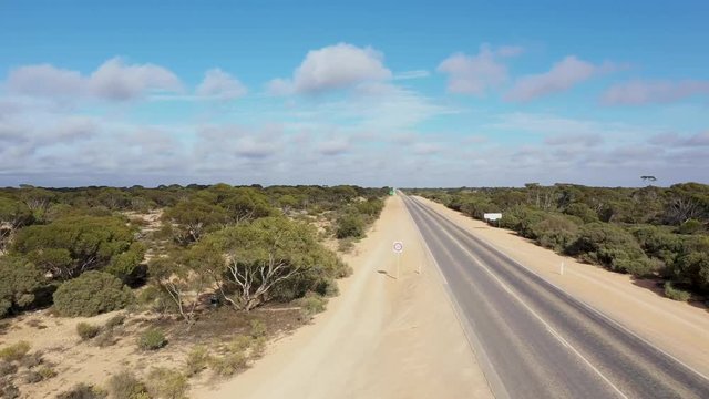 4K drone footage over the start of Australia's longest straight road (90miles) over the Nullarbor Plain in South Australia