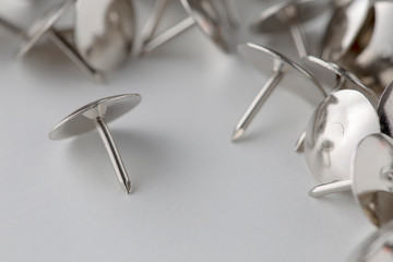 drawing pins metal silver on white background