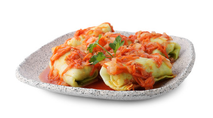 Delicious cabbage rolls with sauce isolated on white