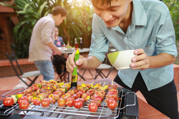 Barbeque Grill Street Food in thailand,Eat outdoors in a happy family.