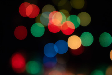 Colorful light bulbs and vivid round bokeh lights tree festive mood lightning