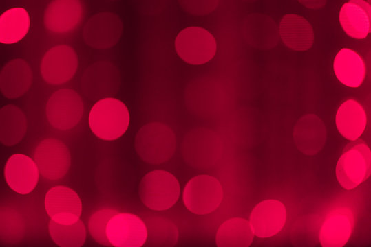 Bright red background with soft round bokeh lanterns