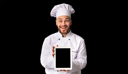 Chef Man Showing Tablet Blank Screen Standing On Black Background