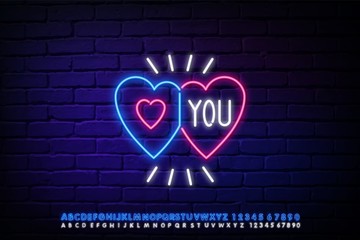 Illuminated neon love hearts sign frame light electric banner glowing on brickwall background.Valentines Day,bar concept.Neons sign 2 heart shapes billboard,poster,signboard