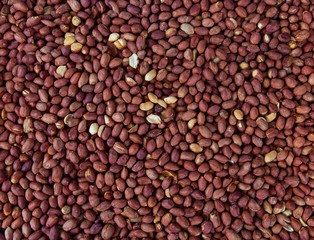 freshly roasted salted peanuts background
