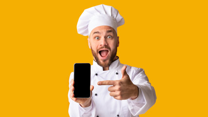 Excited Chef Man Showing Smartphone Screen Posing, Studio Shot, Panorama