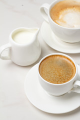 different types of coffee on a white background