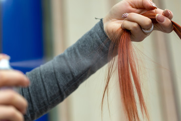 beauty dyed her hair and does hairstyle in a beauty salon