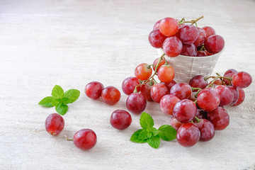  Red grapes on a white background