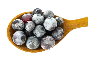 frozen blueberries isolated on white background