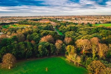 Saint Annes Park forest in autumn, Aerial view above the park in fall. The park has a range of...