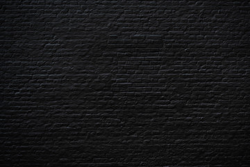 Old black brick wall texture background,brick wall texture for for interior or exterior design backdrop,vintage dark tone.