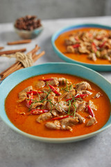 Dried red pork coconut curry, Thai cuisine.