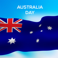 Obraz na płótnie Canvas The realistic flag of Australia flies in the wind. Australia Day. Isolated on blue sky background. Vector illustration.