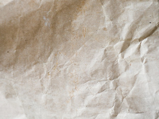 Crumpled kraft paper close-up. Background made of paper. Background texture.