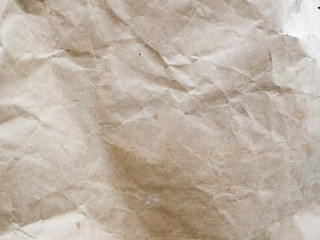 Crumpled kraft paper close-up. Background made of paper. Background texture.