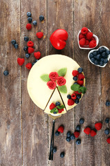 Homemade cheesecake with fresh raspberries and mint for valentines day - healthy organic summer dessert pie cheesecake. Vanilla Cheese Cake for dessert