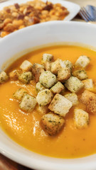 Home prepared vegetable cream soup with croutons
