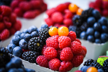 fresh berries close up - strawberries, blueberries, red berries, raspberry, black berries 