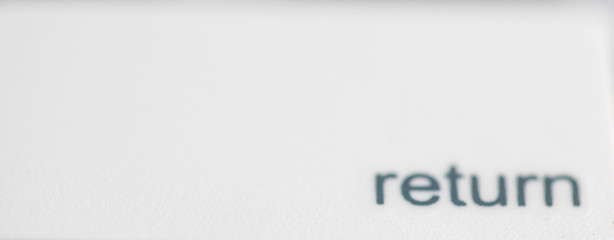 return button close up computer white keyboard, use for command action program to enter or step back