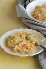 Fresh salad of raw cabbage, leeks and carrots, multivitaminico natural food
