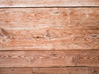 Orange wooden background close-up. Background from wood tiles. Background texture.