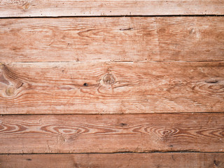 Naklejka premium Orange wooden background close-up. Background from wood tiles. Background texture.