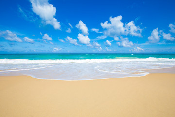 Fototapeta na wymiar White sand beach turquoise sea water against blue sky with cloud seascape vacation background
