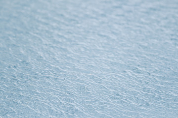 Water waves surface background. Aqua background texture. Abstract water ripples selective focus. Design element for banner and artwork