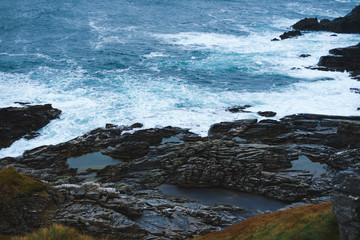 Fototapeta premium waves at rocke sea shore