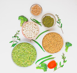 Pyramid from plates with vegetable protein sources on white background. Healthy vegetarian food.