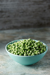 frozen green peas in a bowl