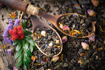 Dried leaf tea on old background