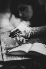 There is a girl in the meadow, the sun rises, there is fog