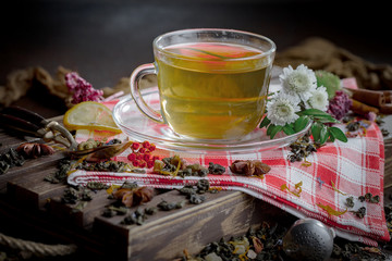 Tea in a cup on an old background