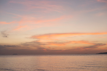 Sea pink sunset. Beautiful color clouds.