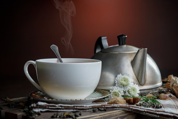 Tea in a cup on an old background