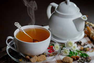 Tea in a cup on an old background